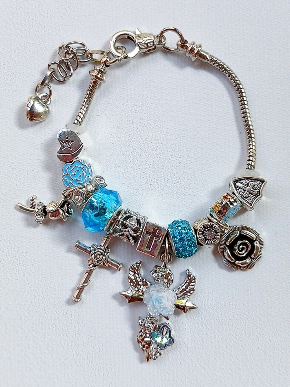 Silver-Tone Blue Crystal Charm Bracelet with Cross & Angel Charms